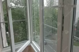 Остекление и отделка балкона деревянной вагонкой