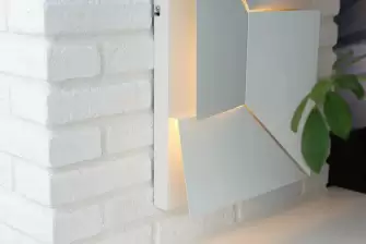 Облицовка П-образного балкона искусственным камнем с утеплением