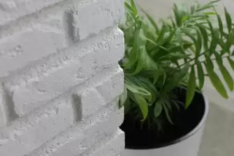 Облицовка П-образного балкона искусственным камнем с утеплением