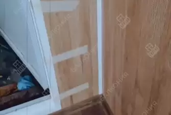 Панорамное остекление балкона и отделка ламинатом и панелями ПВХ